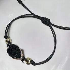 Black Leather Bracelet with Gold and Black Charm